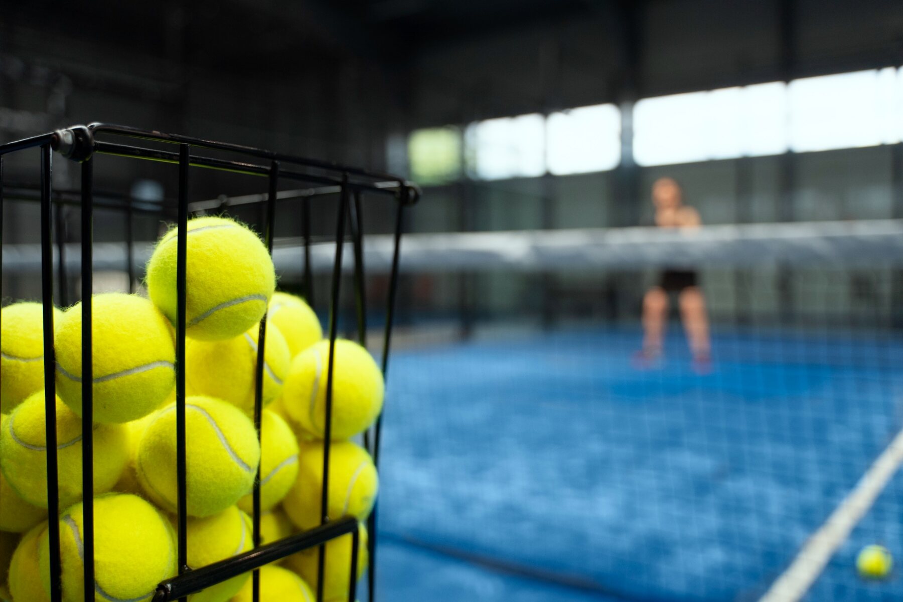 Indoor tennis court and tennis balls