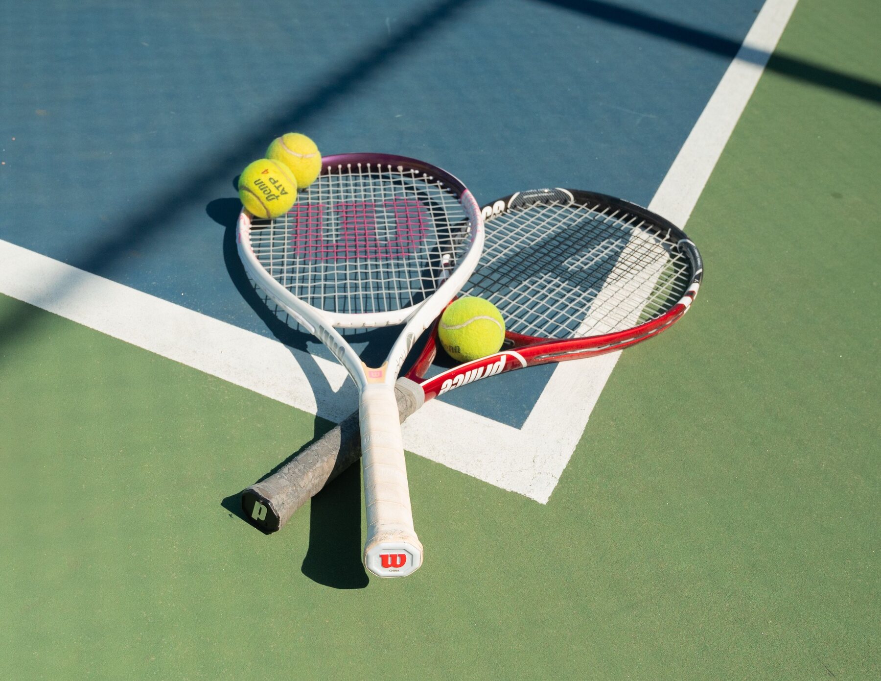 Tennis racquets and balls ready for league play